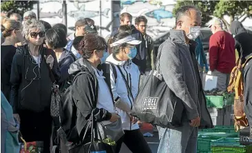  ?? KEVIN STENT/STUFF ?? Wellington’s Harboursid­e Market reopened with crowded conditions at level 2.