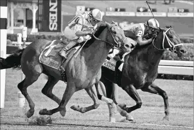  ?? RONNIE BETOR ?? Takaful (right) runs second to Practical Joke in the Jerkens. He could go next in the Vosburgh.