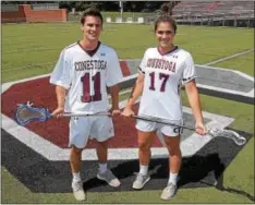  ?? PETE BANNAN — DIGITAL FIRST MEDIA ?? Conestoga’s Liz Scott and Tommy Sopko completed the sweep as the Daily Local News Girls and Boys Lacrosse Players of the Year.
