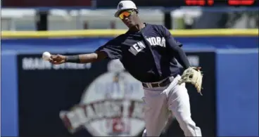  ?? JOHN RAOUX — THE ASSOCIATED PRESS ?? New York Yankees shortstop Jorge Mateo throws out Toronto Blue Jays’ Ryan Goins at first after fielding a ground ball in the fourth inning of a spring training baseball game, Thursday in Dunedin, Fla.