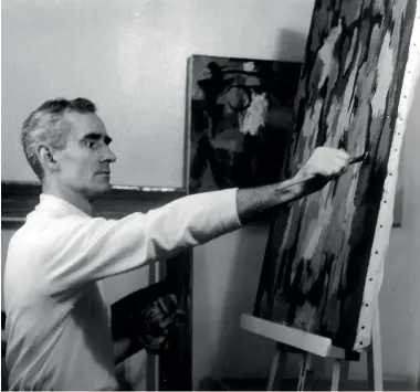  ??  ?? Douglas MacDiarmid painting in his Paris studio in the 1960s.