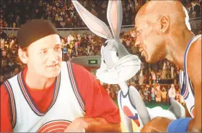  ?? Associated Press ?? Bill Murray, left, Bugs Bunny and Michael Jordan are shown in a scene from the Warner Bros. film “Space Jam.”