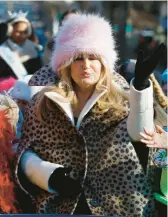  ?? MICHAEL DWYER/AP ?? Actor Jennifer Coolidge waves Saturday during a parade in her honor in Cambridge, Massachuse­tts.