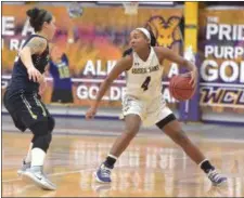  ?? PETE BANNAN — MEDIANEWS GROUP ?? West Chester University’s Kyra Jefferson looks for an open pass against University of Pittsburgh-Johnstown Wednesday evening.