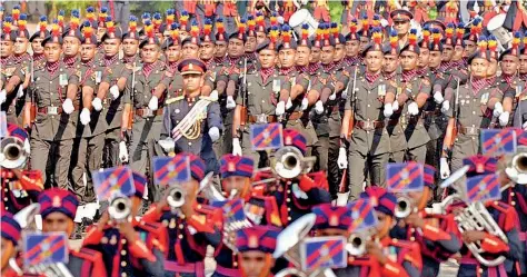  ?? ?? LANKA’S INDEPENDEN­CE DAY SHOW: The boast of heraldry and the pomp of power lined up in regimental file