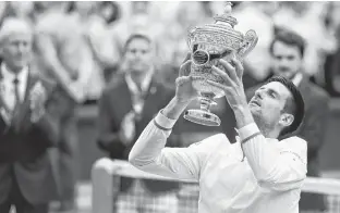  ?? REUTERS ?? Serbia’s Novak Djokovic’s win at Wimbledon Sunday, his 20th career and third Grand Slam title of 2021, sets him up to potentiall­y win all four Grand Slam events this year, not to mention a chance for an Olympic gold medal.