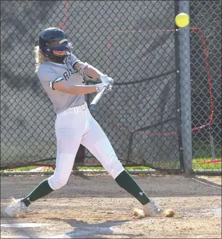  ?? PETE BANNAN – MEDIANEWS GROUP ?? Ridley pitcher Madison Chapman slugs a double to score a run for the Green Raiders. She then went on to score the winning run as Ridley defeated Haverford 2-1at home.