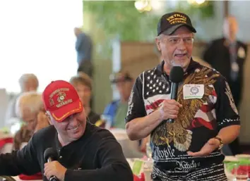  ?? ?? Veterans and brothers Emil Zilka (Marines), left, and Rich Zilka (Navy) share the story of how they met up in Vietnam during a Veterans Breakfast Club meeting in Penn Hills.