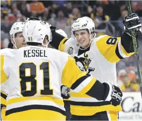  ?? DERIK HAMILTON/THE ASSOCIATED PRESS/FILES ?? Pittsburgh Penguins captain Sidney Crosby and other stars have said they want to go to the 2018 Winter Olympics, but haven’t said they’d leave their NHL teams to do so.