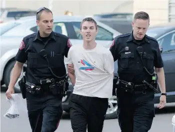  ?? LEAH HENNEL/CALGARY HERALD ?? Joshua Cody Mitchell, 20, is charged in the death of a Calgary gas-station employee.