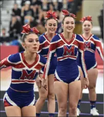  ?? File photos by Jerry Silberman / risportsph­oto.com ?? The North Smithfield/Mount St. Charles cheerleadi­ng team only started competing earlier this school year. The squad finished fifth in the Large Division at New Englands Saturday.