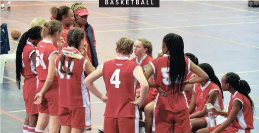  ??  ?? ST Mary’s School, Waverley, 1st basketball team during a time-out session.