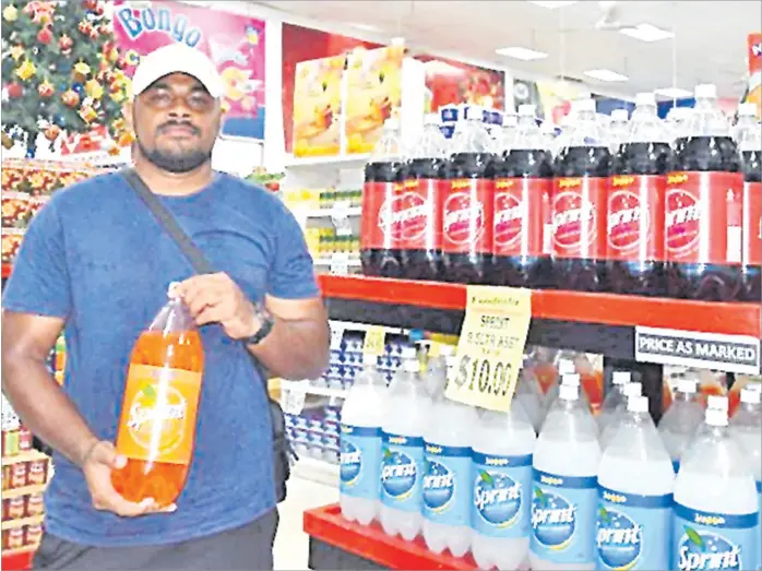  ?? Picture: SUPPLIED ?? Ro Imanueli Tuivonovon­o of Tacirua with a bottle of Sprint at Food City in Suva.