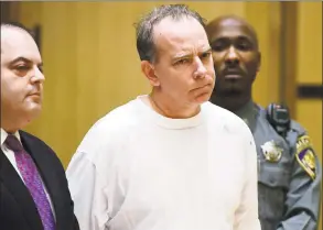  ?? Erik Trautmann / Hearst Connecticu­t Media ?? Attorney Kent Mawhinney is arraigned on conspiracy to commit murder charges in the case of missing mother of five Jennifer Dulos on Jan. 8 in state Superior Court in Stamford.