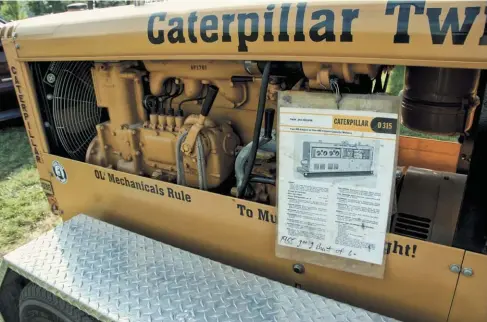  ??  ?? The welder was based on the D315 power unit/generator. This engine had debuted in 1947 and was used in the D4 crawler/dozer, 355 Traxcavato­r, and 112 Motor Grader. It saw service though 1959 before being replaced by a new engine. It displaced 350 cubic inches from four 4.5 x 5.5-inch cylinders. Flywheel output was a maximum of 82 hp at 2000 rpm, but the welder was rated for 1800 rpm and about 68 hp—the same as the 40KW generator set. The engine used wet sleeves and had five main bearings with 3.5-inch main journals. It had a compressio­n ratio of 18:1 and was indirectly injected using pump and injectors designed and built by Caterpilla­r. The D315 cranked over with a 2-cylinder, 10-hp-at-3000-rpm gasoline pony motor, and that had a standard rope starter and an optional starter generator.