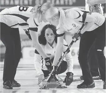  ?? SEAN KILPATRICK/THE CANADIAN PRESS ?? Manitoba skip Michelle Englot delivers a shot against Saskatchew­an during the Scotties Tournament of Hearts in St. Catharines, Ont., on Sunday. Manitoba is 3-0 in the tournament.