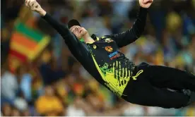  ?? Lanka Photograph: Kevin Manning/Action Plus/REX/Shuttersto­ck ?? Steve Smith leaps over the boundary ropes during Australia’s T20 internatio­nal with Sri