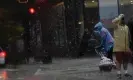  ?? AFP/Getty Images ?? Umbrella is blown inside out as a person crosses the street during a storm in Washington DC. Photograph: Stefani Reynolds/