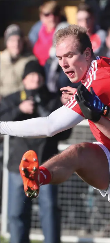  ??  ?? Conor Grimes gets his shot away despite coming under pressure against Roscommon on Sunday.