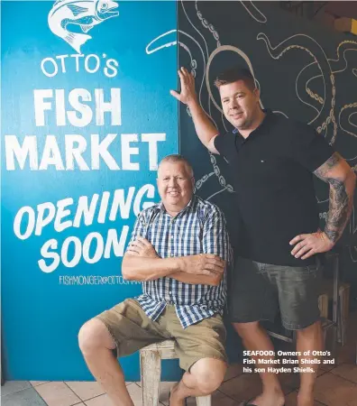  ??  ?? SEAFOOD: Owners of Otto's Fish Market Brian Shiells and his son Hayden Shiells.