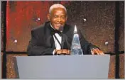  ?? Stephen Lovekin ?? A CARIBBEAN LILT Irving Burgie co-wrote the Harry Belafonte hit “Day-O (The Banana Boat Song),” which became a musical staple around the world.