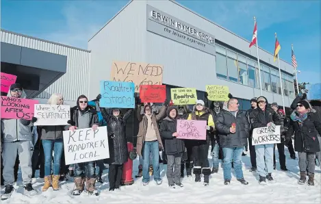  ?? PETER LEE WATERLOO REGION RECORD ?? Erwin Hymer Group employees protest outside the company’s plant on Reuter Drive in Cambridge on Tuesday morning. They are angry about the loss of their jobs.