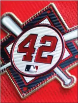  ?? Tribune News Service/getty Images ?? The patch on the sleeve of an Atlanta Braves jersey with Jackie Robinson’s No. 42 is seen in the first inning of an MLB game against the Miami Marlins at Truist Park on April 15, 2021 in Atlanta, Georgia.