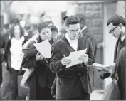  ?? Stan Honda
AFP/Getty Images ?? JOB SEEKERS wait in line in Queens, N.Y., in May 2012. The job market has greatly improved since then.