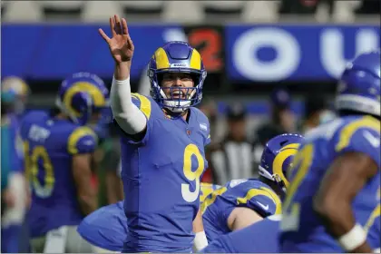  ?? MARK J. TERRILL — THE ASSOCIATED PRESS ?? The Los Angeles Rams acquired quarterbac­k Matthew Stafford for games like this, a wild-card matchup against the division rival Arizona Cardinals.