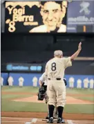  ?? PICTURE: JASON SZENES /
EPA ?? ESTEEMED: Former New York Yankees
catcher Yogi Berra waves to the Yankees Stadium
crowd during a ceremony on September
21, 2008. Berra died at the age of 90 on Tuesday of natural
causes.