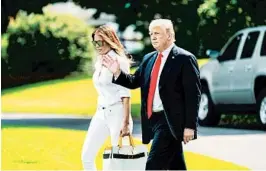  ?? JIM LO SCALZO/EPA ?? President Trump and the first lady leave the White House on Friday for a weekend stay at his resort in Bedminster, N.J.