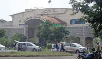  ?? — AFP ?? Estonian sailors board a car as they come out of central prison in Chennai on Tuesday.