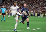  ?? (AFP) ?? Real Madrid’s Karim Benzema vies for the ball with Aymeric Laporte (right) during the UEFA Champions League semi-final match at the Santiago Bernabeu stadium in Madrid recently.