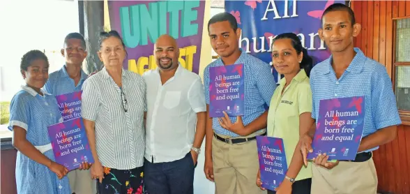  ??  ?? Director of the Fiji Human Rights and Anti-Discrimina­tion Commission (HRADC), Ashwin Raj with students at a human rights workshop in Labasa