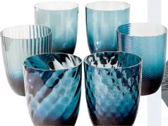  ??  ?? Avio Blu Murano water glasses, $300 for set of six, by Nason Moretti at Monc XIII, Sag Harbor.