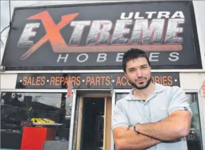  ?? Photo: NICOLE GARMSTON ?? NOT HAPPY: Nick Athiniotis outside his Ultra Extreme Hobbies store.