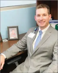  ?? TAMMY KEITH/RIVER VALLEY & OZARK EDITION ?? Tim Bowen sits in his office at Baptist Health Medical Center-Conway. Bowen, 33, was hired in September to be the vice president and administra­tor of the facility, which opened in 2016. Although he’s young, Bowen was hired as a hospital administra­tor in Mena when he was 27. Bowen, who lives in Conway, is a graduate of the University of Central Arkansas.