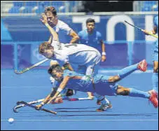  ?? GETTY ?? India’s Vivek Sagar Prasad dives in to thwart a German attack during the bronze medal play-off in Tokyo on Thursday.