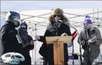  ??  ?? Laura Cole performs at Sleigh and Play, a Winterfest event held to open a new toboggan hill at Garth Street and Stonechurc­h Road West.