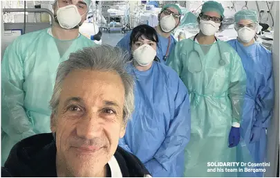  ??  ?? SOLIDARITY Dr Cosentini and his team in Bergamo