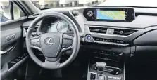  ??  ?? The interior of the Lexus UX is a classy affair. The infotainme­nt system works with Apple CarPlay.