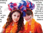  ??  ?? BRIGHT
SPOT: Girls mark King’s Day in Amsterdam