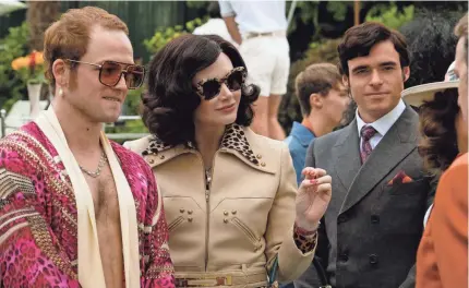  ?? DAVID APPLEBY ?? Taron Egerton stars as Elton John, Bryce Dallas Howard is his mother Sheila, and Richard Madden plays manager John Reid in the musical fantasy “Rocketman.”