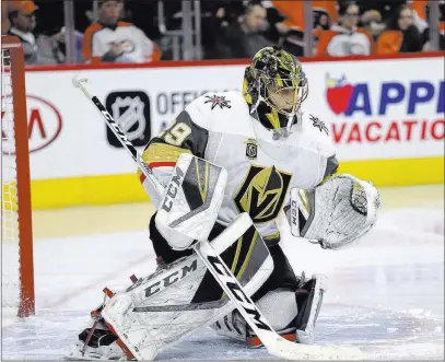  ?? Matt Slocum ?? The Associated Press Golden Knights goaltender Marc-andre Fleury gets in position to protect the crease against the Philadelph­ia Flyers on Monday.