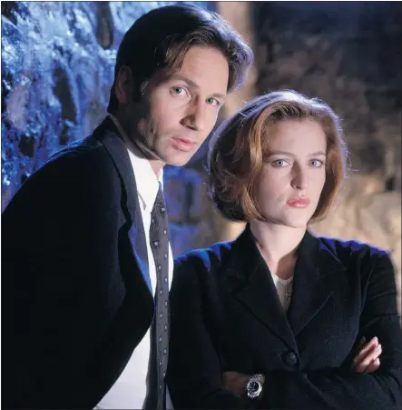  ??  ?? David Duchovny, left, as Fox Mulder and Gillian Anderson as Dana Scully in The X-Files.