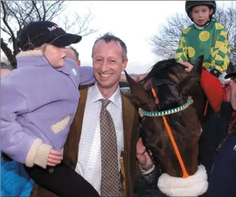  ??  ?? Tommy Cooper with a young Bryan up on Total Enjoyment at the stables in Blennervil­le, Tralee.