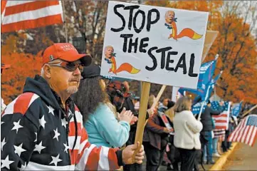  ?? PAULA BRONSTEIN/AP ?? President Trump’s supporters protest against presumptiv­e President-elect Joe Biden’s win Saturday in Salem, Oregon.