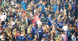  ??  ?? Spectators throw bottles on the ground when India were on the verge of losing the T20 contest against South Africa at the Barabati stadium in Cuttack on Monday.