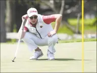  ?? Tyler Sizemore / Hearst Connecticu­t Media ?? Greenwich’s Ben Ropiak lines up a putt during a tournament last season.