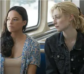  ??  ?? Michelle Rodriguez and Elizabeth Debicki come up against the system in Widows.